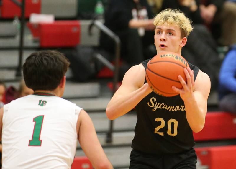 Sycamore's Thatcher Friedrichs shoots a jump shot over L-P's London Cabrera on Tuesday, Jan. 31, 2023 at L-P High School.