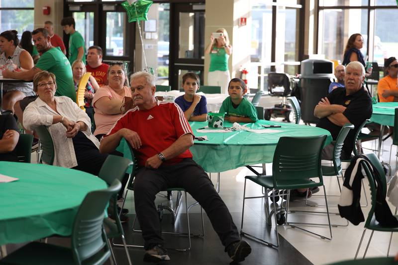 Brad Guzan’s parents Karen, far left, and Rick, far right, watch the Atlanta and Miami soccer match at the Providence Catholic Brad Guzan watch party on Tuesday, July 25 in New Lenox. Guzan is a Providence Catholic alumnus who plays goalie for MLS’ Atlanta United FC.