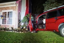 Car crashes into Woodstock home, lands inches from where resident sat