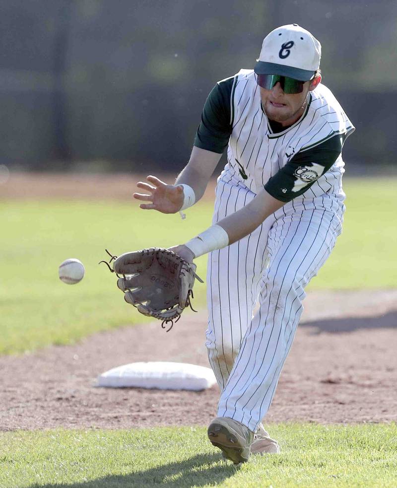 Grayslake Central's Zach Hindman picks a shot down the third-base line during the IHSA Class 3A sectional semifinals, Thursday, June 2, 2022 in Grayslake.
