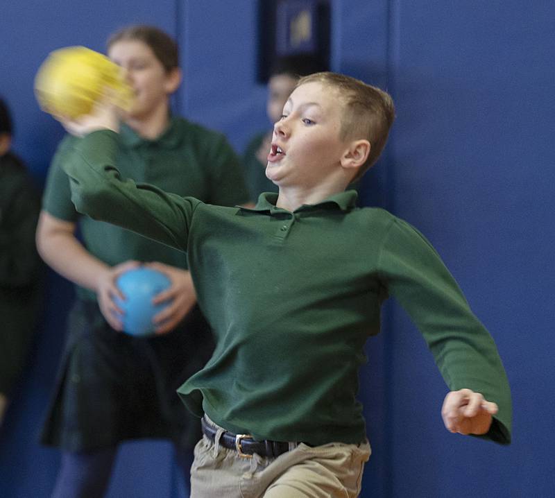 St. Andrews sixth grader Derik Kobbeman fires a shot Monday, Jan. 26, 2026, during the dodgeball match.
