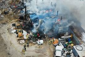 Earlville firefighters battle pole barn fire over two days