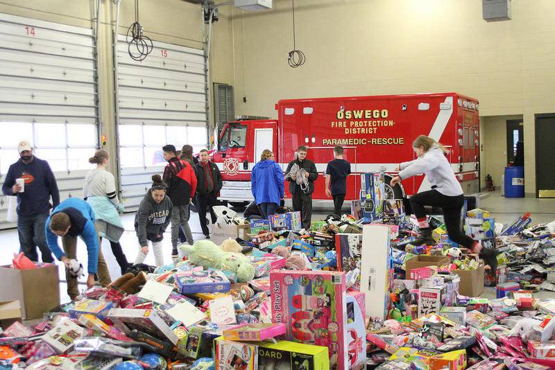 A record-setting number of toys and bicycles; 8,182 toys and 111 bicycles were donated to Toys for Tots in the Oswego Fire Protection District's 10th annual drive, and were sorted by local junior high students on Dec. 20.