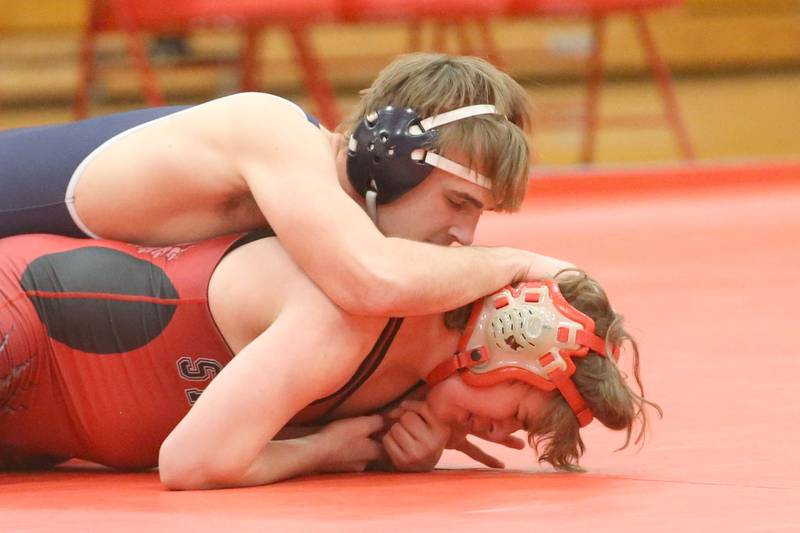 Lisle's Zach Sirovatka wrestels Streator's Alijah Henson during a meet on Wednesday, Jan. 21, 2025 in Pops Dale Gymnasium at Streator High School.