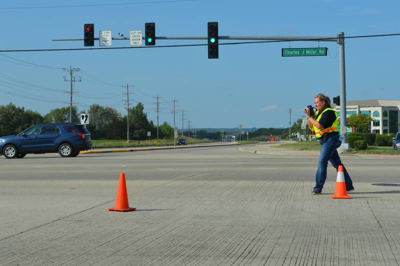 Investigators with the McHenry Police Department spent hours taking photos and gathering evidence at the intersection of Illinois Route 31 and Bull Valley Road on Sunday, Aug. 29, 2021.