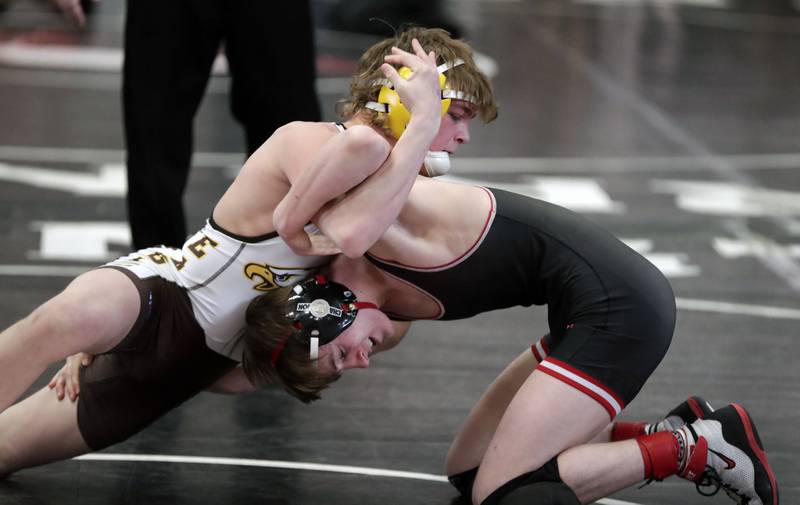 Barrington’s Brian Beers wrestles Jacobs’ James Wright at 126-pounds during the IHSA 3A Individual Sectional wrestling meet at Barrington High School Saturday February 12, 2022.