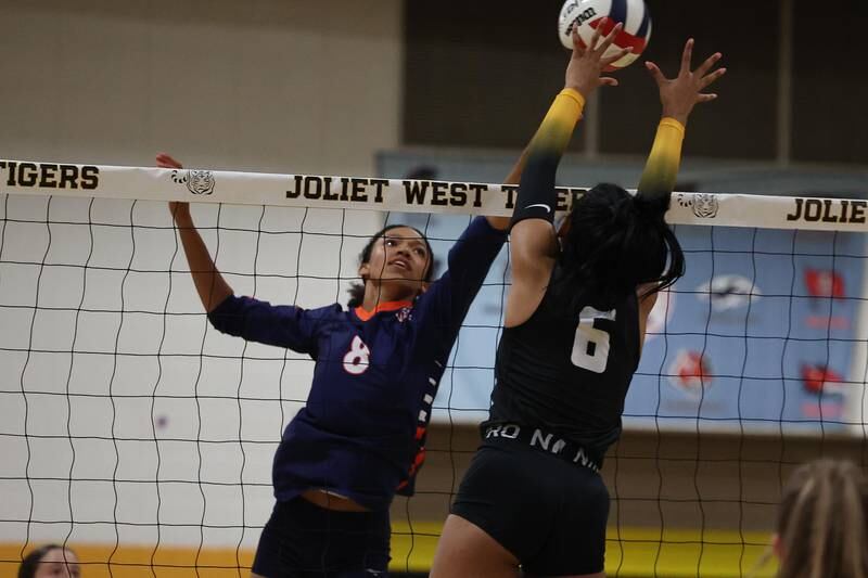 Romeoville’s Arianna Thomas stretches for the ball against Joliet West on Thursday, Sept. 5, 2024 in Joliet.