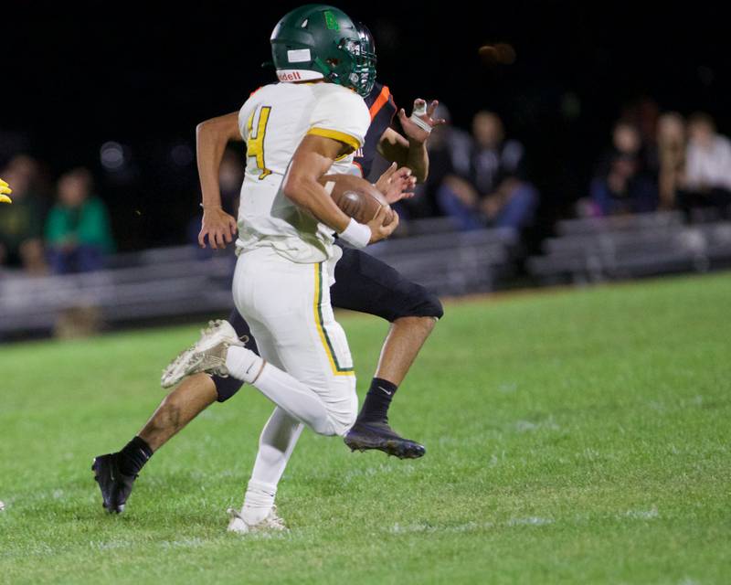 Crystal Lake South's Anthony Demirov outruns the defense by Crystal Lake Central on Friday, Sept. 27,2024 in Crystal Lake.