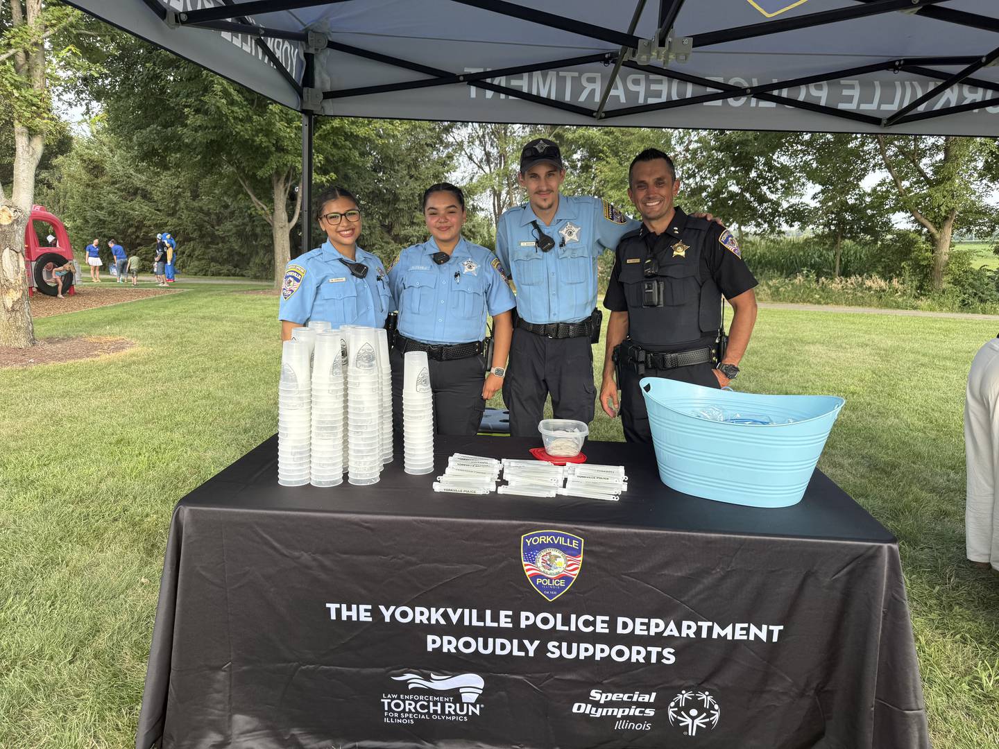 Yorkville Police Department officials greeted community members in Yorkville for the National Night Out event. Pictured, Community Service Officer Naily Vargas, CSO Natalia Perez, CSO Tyler Madsen and Deputy Chief Garrett Carlyle.