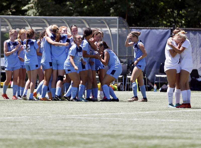 Richmond-Burton's Jordan Otto and Addison Sell console each other as Willows Academy celebrates winning the Class 1A Dominican super-sectional between Willows Academy and Richmond-Burton HS in River Forest on Saturday, May 25, 2024.