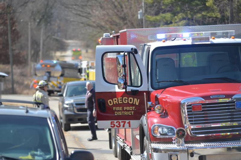 Multiple fire departments brought in water to help Oregon firefighters battle a house fire at 2010 S. Second St., in Daysville on Wednesday, March 12, 2025.