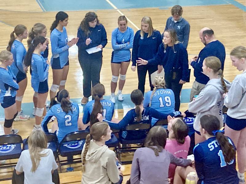 Bureau Valley coach Saiger Barnett rallies her troops after dropping the first set to West Central at the Storm Cellar Wednesday night. The Storm rallied from a 19-13 deficit in game 2 to win 25-21 and took the match with a 25-21 clincher.