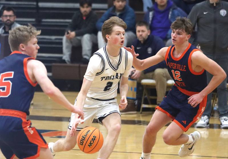Cary-Grove’s AJ Berndt heads for the hoop against Naperville North in varsity boys basketball Hinkle Holiday Classic action on Monday, Dec. 21, 2025, at Jacobs High School in Algonquin.