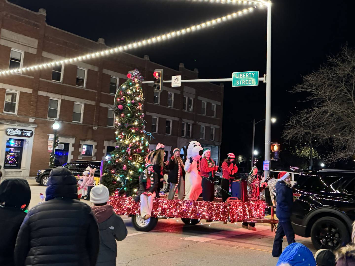 The On Broadway Dancers out of Diamond perform on their float as it travels down Liberty St. in Morris.