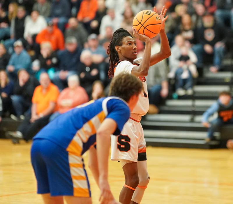 Sandwich's Simeion Harris (1) shoots a free-throw late in the 4th quarter of play against Johnsburg during a basketball game at Sandwich High School on Friday, January 31, 2025.