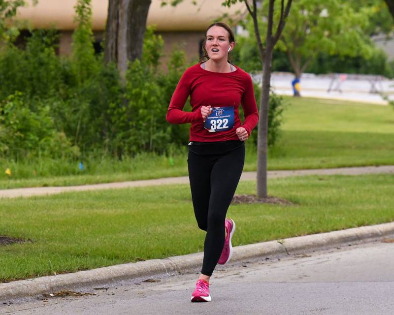 Alyssa Zimmerman runs during the Race to the Flag 5k and was the second overall female winner on Sunday May 25, 2025, with a time of 22:52 held at Ty Warner Park in Westmont.
