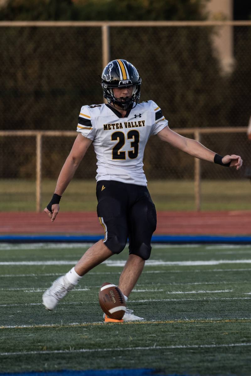 Metea Valley's Logan Phelan kicks-off during a varsity football game against Lincoln-Way East at Lincoln-Way East on Oct. 30, 2025.
