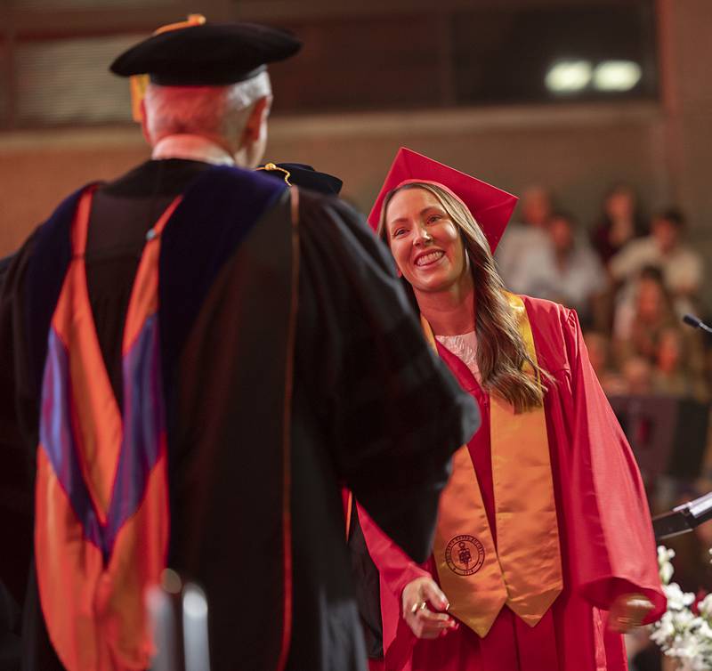 Samantha Lahey steps up to receive her diploma Friday, May 15, 2026, during Sauk Valley Community College’s commencement ceremony.