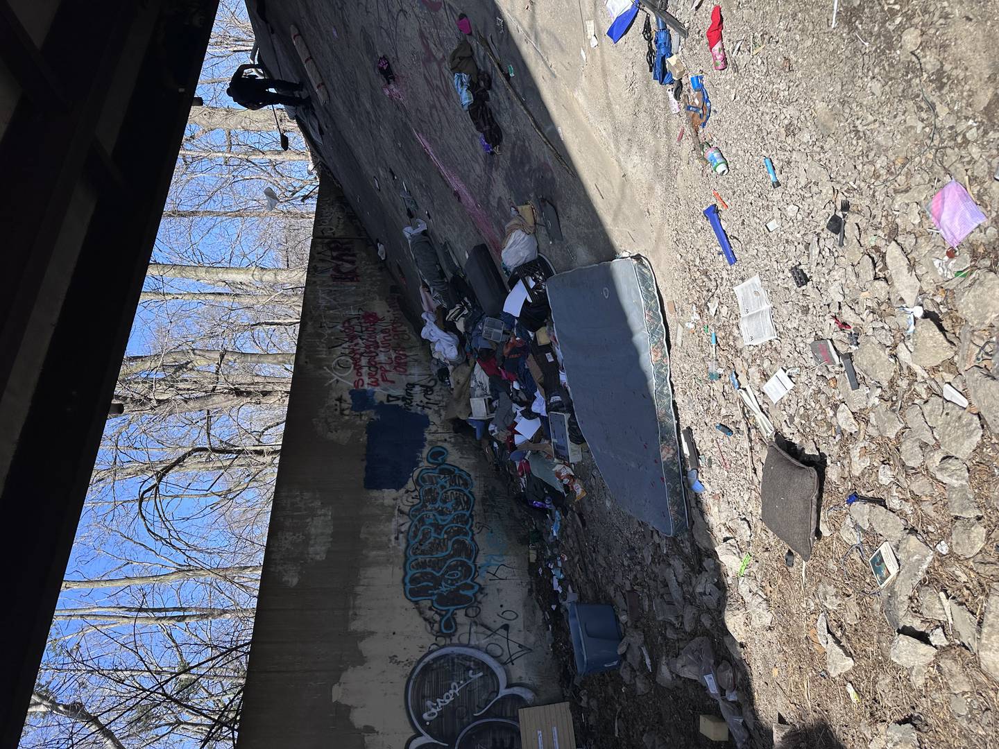 An abandoned homeless camp is pictured near Avenue G in Sterling.