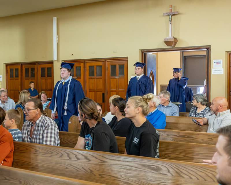 2026 Marquette Academy Graduates walk down isle during the Graduation Ceremony on May 24, 2026 at St. Columba Church in Ottawa.