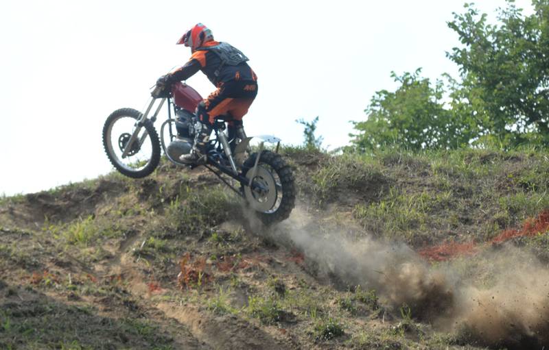 Wade Schultz of Lisbon, Iowa, leaves a trail of dust as he clears the hill at the Rock River Riders Motorcycle Club's hillclimb on Sunday, Aug. 3, 2025.