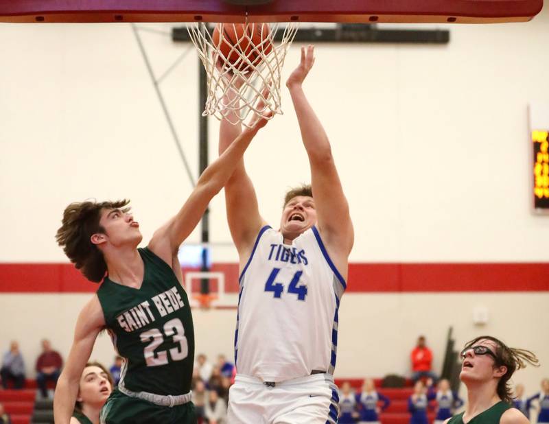 St. Bede's Evan Entrican defends against Princeton's Bennett Williams Saturday night in the Colmone Classic.