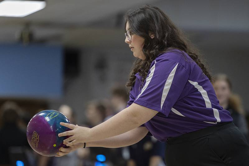 Dixon’s Leslie Pettorini begins her frame Thursday, Dec. 1, 2022 against Sterling.