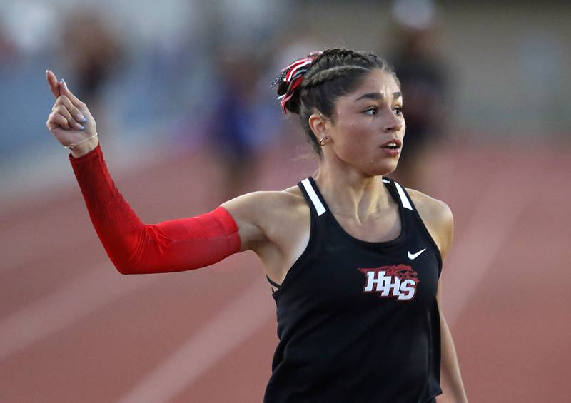 Huntley’s Victoria Evtimov celebrates winning the 4 x 200 meter relay during the Huntley IHSA Class 3A Girls Sectional Track and Field Meet on Wednesday, May 8, 2024, at Huntley High School.