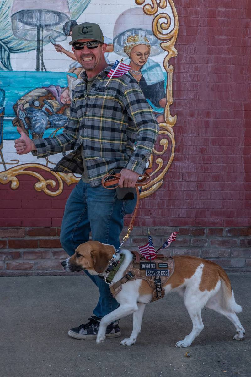 Tim Dippon takes Scotty for a walk.