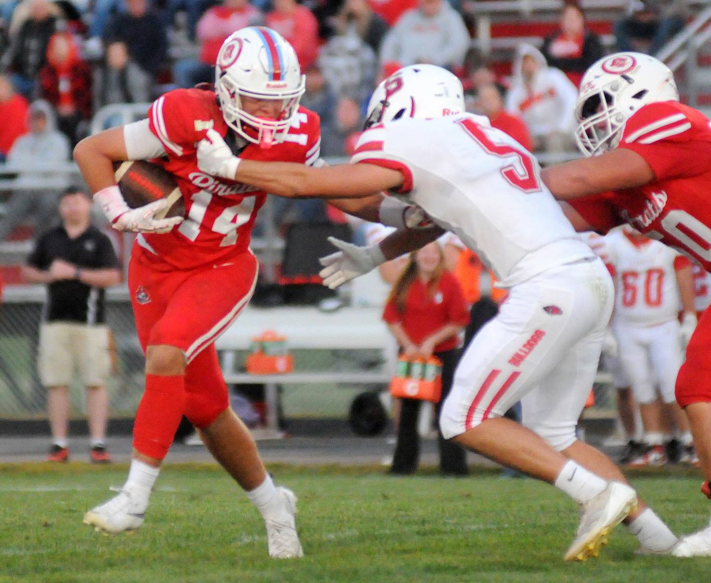 Ottawa's Archer Cechowiz fights a Streator tackle from Tj Horton on Friday, Sept. 5, 2025 at King Field.