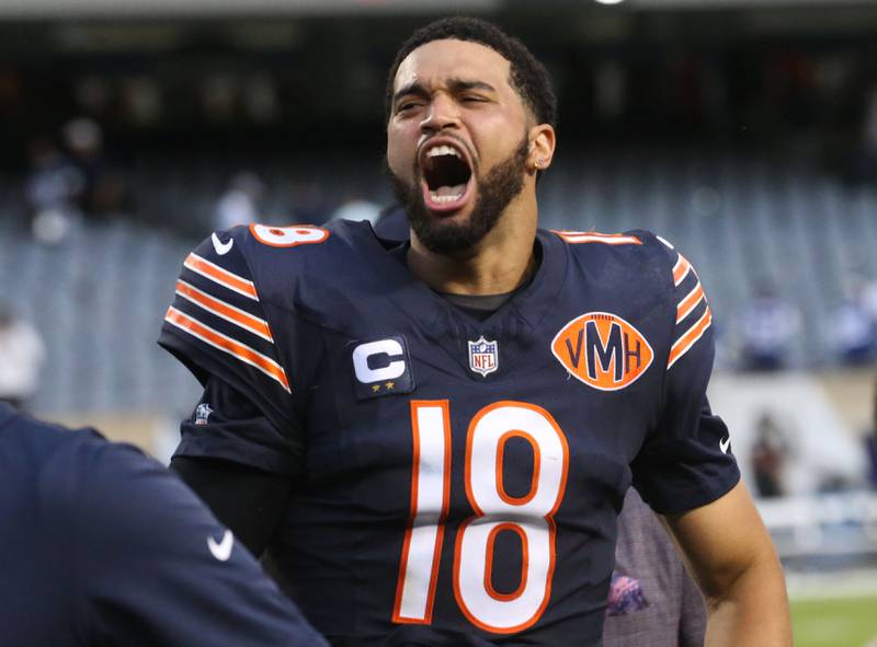 Chicago Bears quarterback Caleb Williams reacts while running off of the field after beating the Dallas Cowboys on Sunday, Sept. 21, 2025 at Soldier Field.