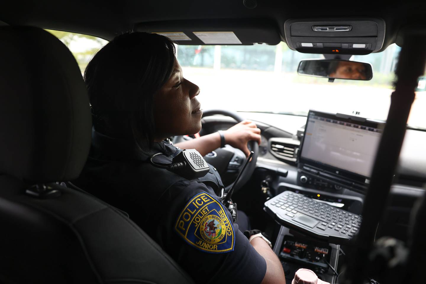 Joliet Junior College Officer Destiny Griffin patrols the the main campus on Wednesday, July 26 in Joliet.