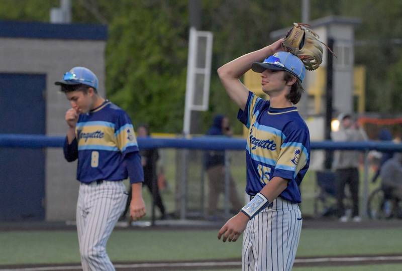 Marquette Academy's Carson Zellers (8) and Alec Novotney (15) react to the 3-2 loss to Chicago Hope Academy in 12 innings during the 1A baseball sectional semifinal at Judson University in Elgin on Thursday, May 25, 2023.