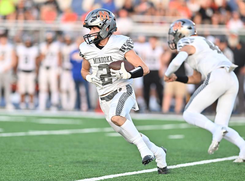 Minooka's Ty Couch runs the ball during a non-conference game against Joliet Central on Friday, Sep 13, 2024 at Joliet. (Dean Reid for Shaw Local News Network)