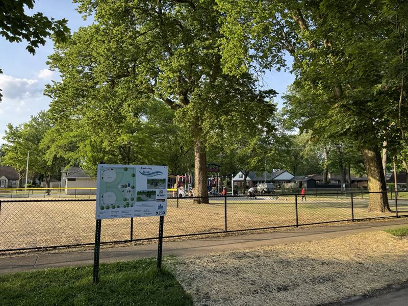 Kids play at the newly opened Goodwill Park on Monday night.