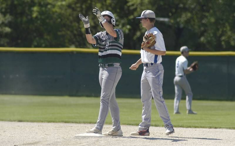 RF baserunner Colby Ward applauds his teammate's hit.. The action took place in the 2A Regional baseball game at Larry Ybarra field at Newman High School, Saturday, May 18th 2024.