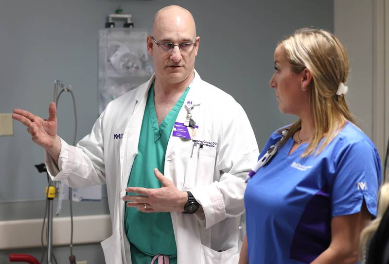 Dr. Gregory Conrad talks with nurse Randa Melms emergency room Thursday, April, 18, 2024, at Northwestern Medicine Kishwaukee Hospital in DeKalb.