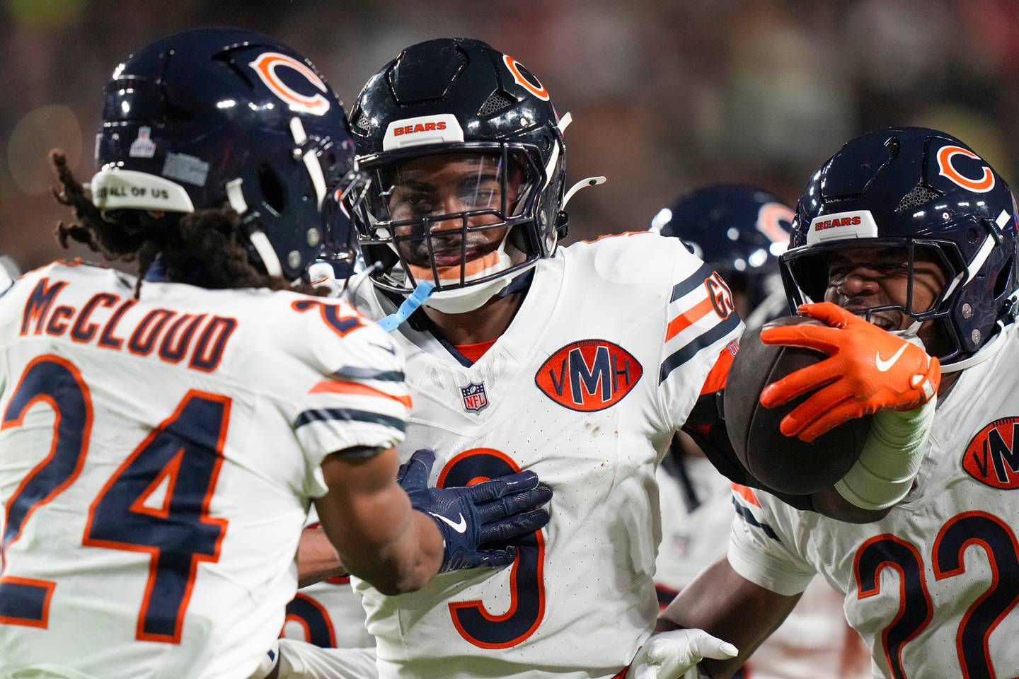 Chicago Bears cornerback Nick McCloud, left, and safety Jaquan Brisker celebrate Brisker's interception during the first half of an NFL football game against the Washington Commanders, Monday, Oct. 13, 2025, in Landover, Md. (AP Photo/Stephanie Scarbrough)