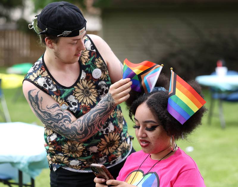 Violeta Shaw, (right) from DeKalb, gets their hair fixed by Dean Allard, also from DeKalb, during the Pride Palooza Friday, May 30, 2025, at Bethlehem Lutheran Church in DeKalb. The event was hosted by Family Service Agency of DeKalb County and Youth Outlook.