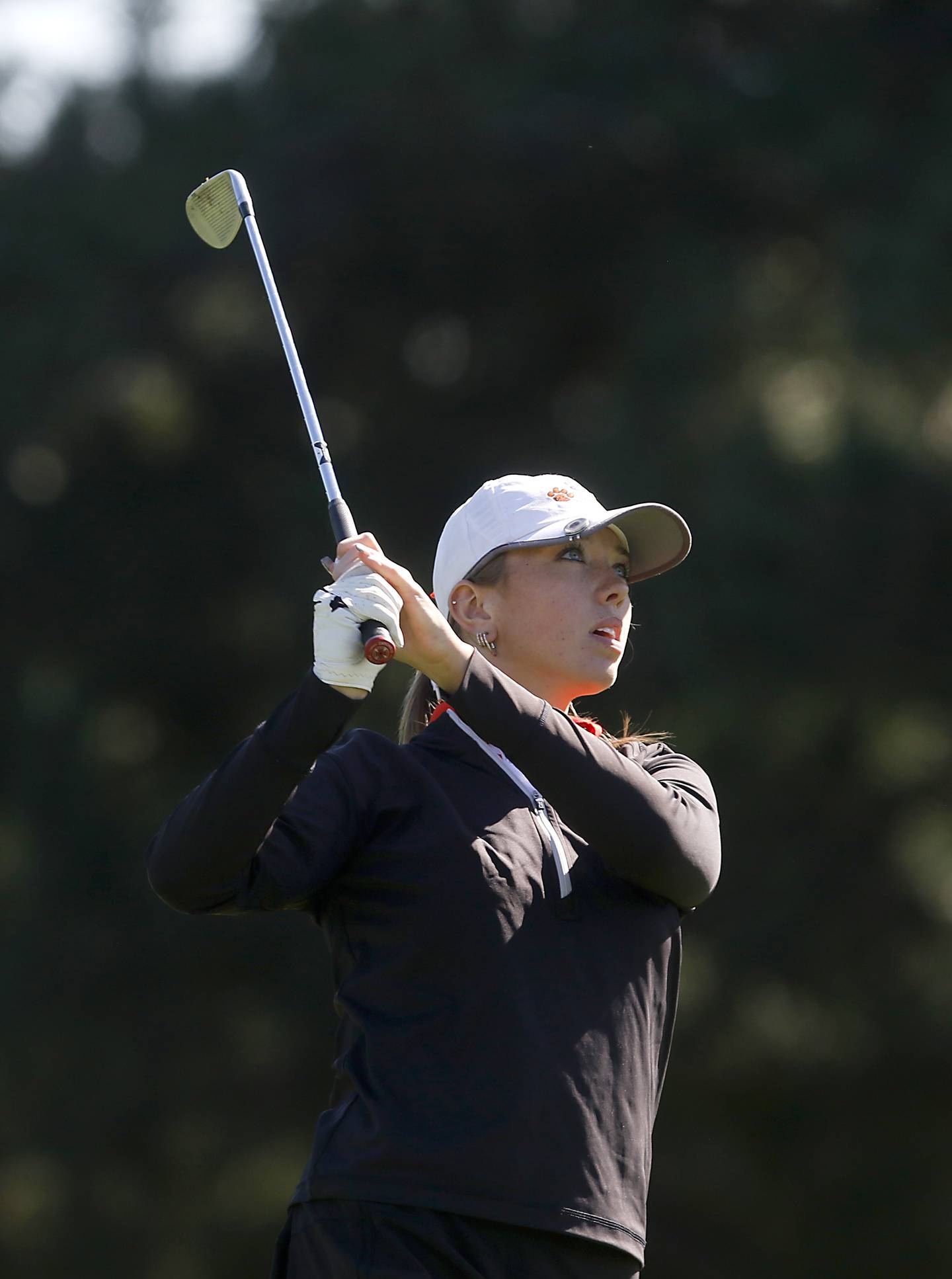 Crystal Lake Co-op’s Delaney Medlyn watches her tee shot the eight hole during the IHSA Class 2A Huntley Girls Golf Regional on Tuesday, Oct. 1, 2024, at Pinecrest Golf Club in Huntley.