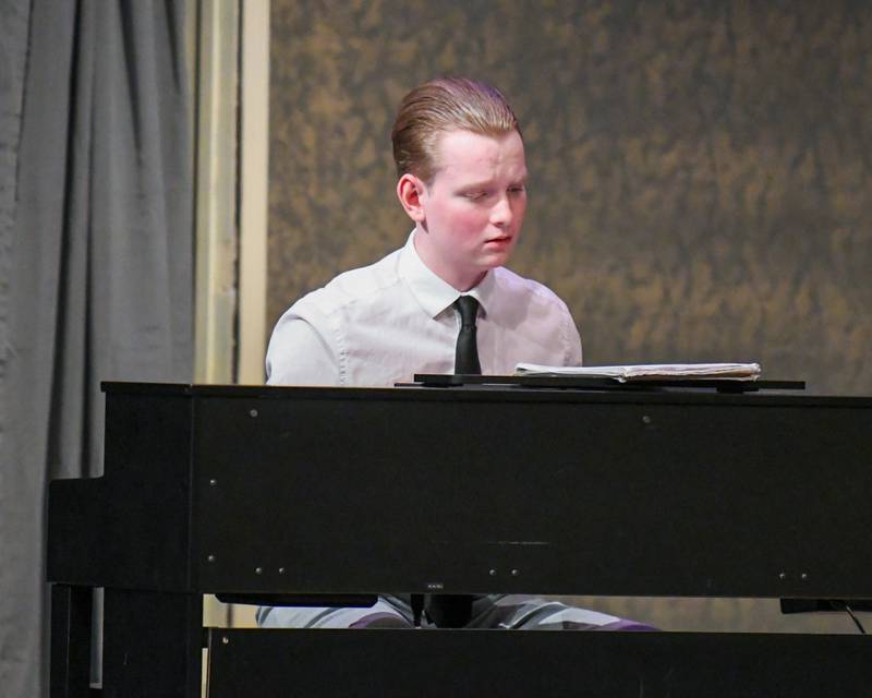 Thomas King tries to write a song during a one act play called the Bittersweet Lullaby on Saturday March 22, 2025, held at Lyons Township High School south campus.