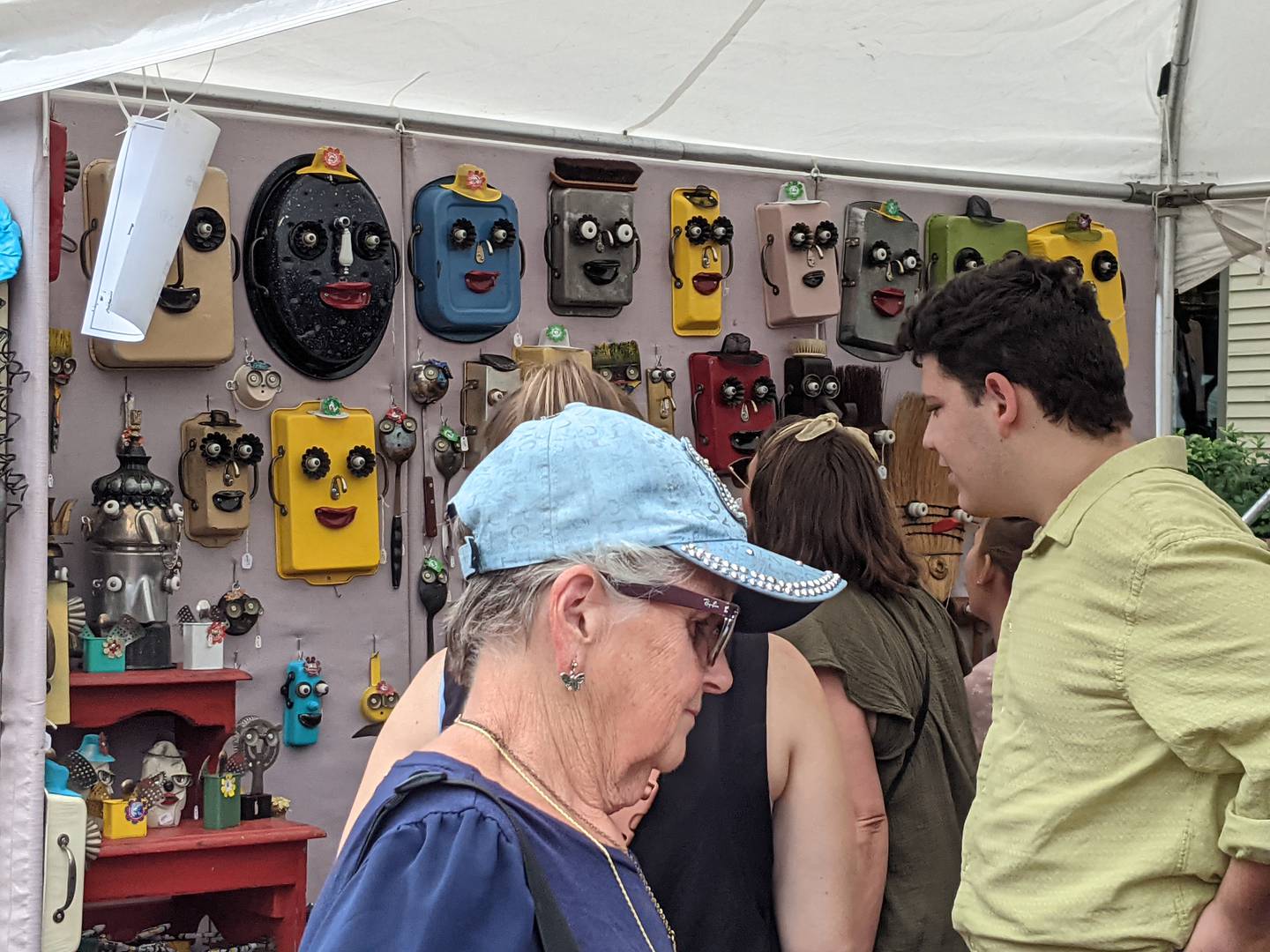 Steve Meadows’ whimsical folk art attracted plenty of attention. He creates his pieces from salvaged junk such as brooms, door knobs and bread pans.
