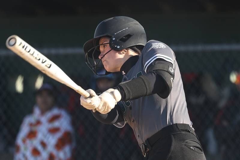 Plainfield Central’s Jamie Crawford drives in a run against Bolingbrook on Wednesday, March 20, 2024.