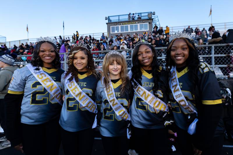 Joliet West’s senior cheerleaders take a photo before a varsity football game between Joliet West and Joliet Central at Joliet West on Oct. 24, 2025, which was also Senior Night.
