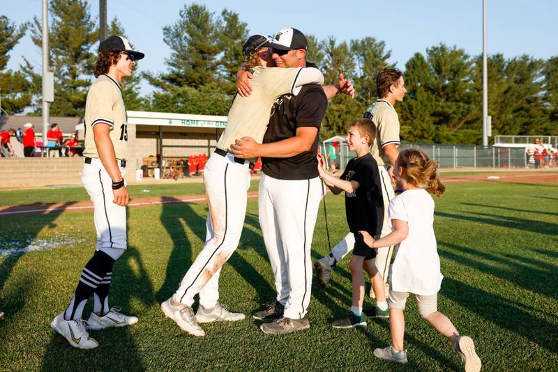 Sycamore players celebrate after defeating Rock Island, 8-0, in an Illinois Class 3A super-sectional, Monday, June 5, 2023, in Geneseo.