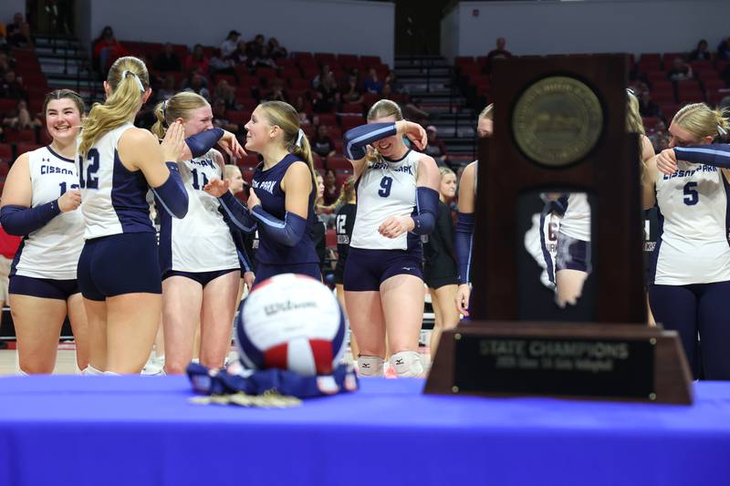 Cissna Park players get emotional as they await the first place trophy following the Timberwolves' victory in two sets, 25-11, 25-14, over Stockton in the IHSA Class 1A State championship on Saturday, Nov. 15, 2025.