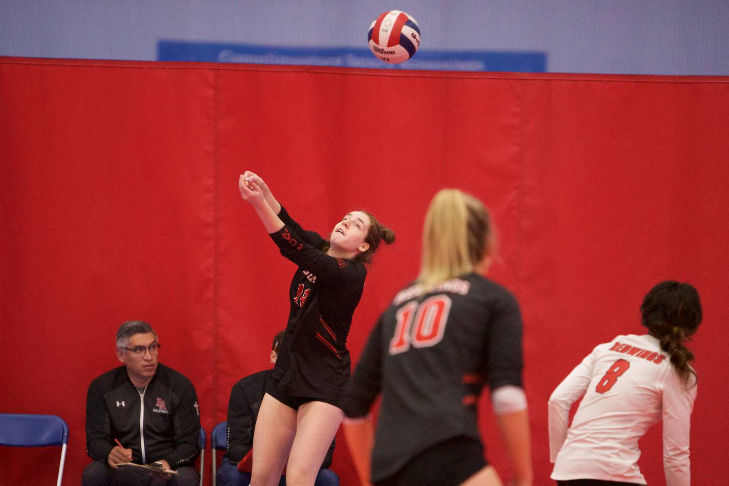 Benet's Gabija Staniskis looks to keep the ball in play against Naperville North during the Championship match at the St. Charles East Scholastic Cup Tournament on Saturday, Oct.8,2022 in Aurora.