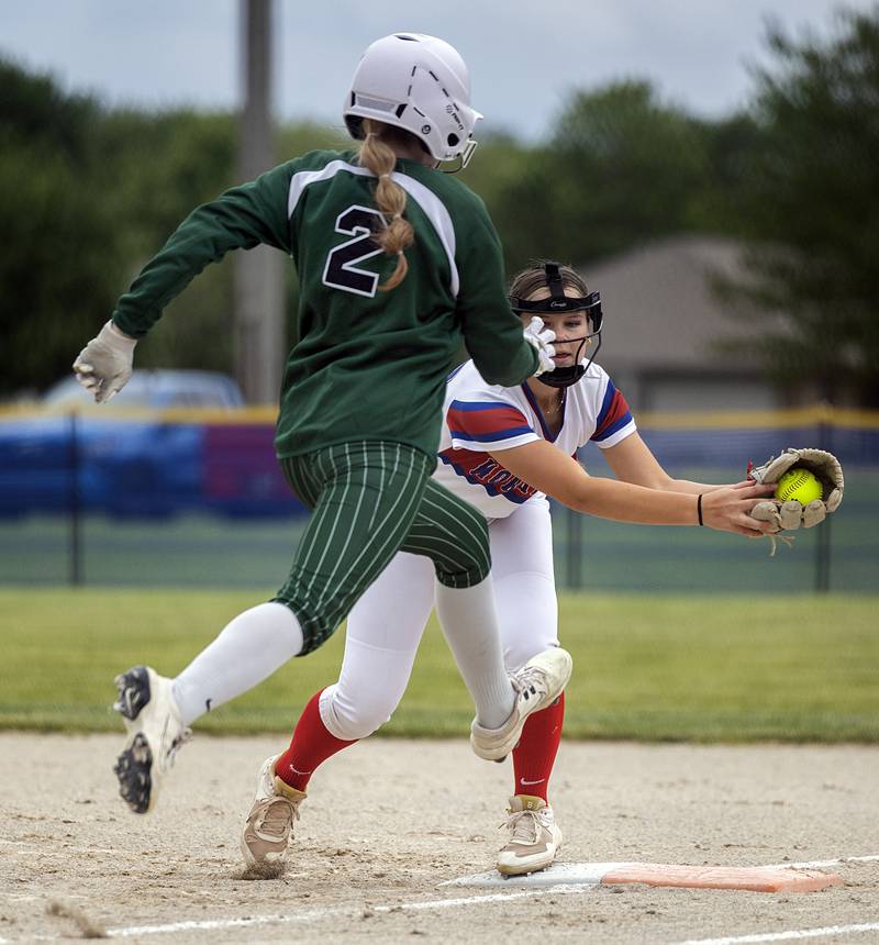 West Carroll’s Addison Sowko lunges to beat the throw at first made by Morrison’s Peyton Lowery Tuesday, May 19, 2026, at the Class 1A softball regionals at Newman.