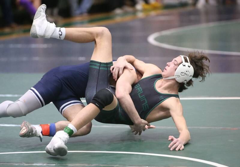 Lisle's Alexander Ferari wrestles St. Bede's Max Moreno in the 126 pound weight class during the Class 1A Regional meet on Saturday, Feb. 8, 2025 at St. Bede Academy.