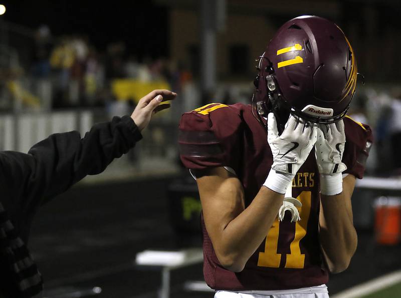 Richmond-Burton's Nate Moreno deals with the emotions of the season coming to a end as St. Laurence defeated Richmond-Burton in an IHSA Class 4A first-round football game on Friday, Nov. 1, 2024, at Richmond-Burton High School in Richmond.
